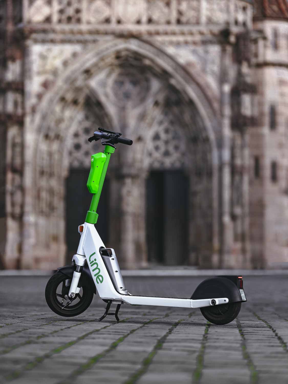 This picture by Philip Reitsperger and Identity Lab shows an e-scooter from Lime in Nuremberg in front of the Frauenkirche.