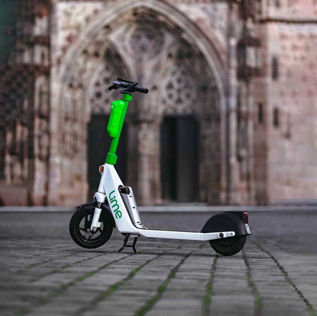 This picture by Philip Reitsperger and Identity Lab shows a Lime e-scooter in Nuremberg in front of the Frauenkirche.